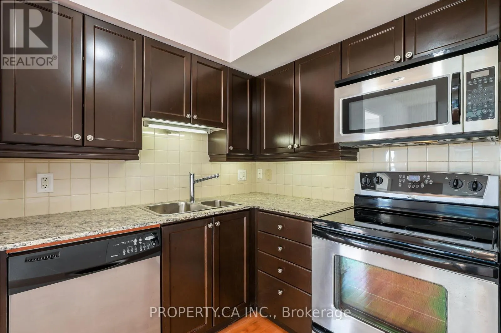 1203 - 736 SPADINA AVENUE