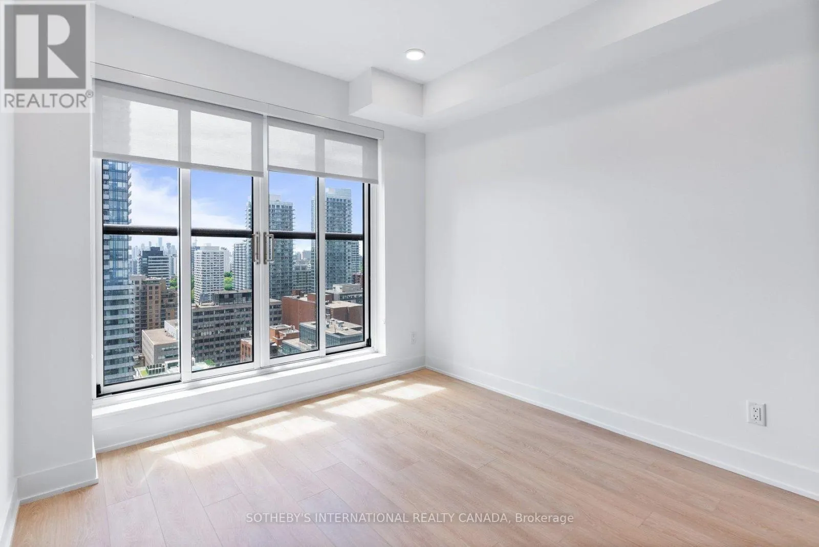 303 - 200 REDPATH AVENUE
