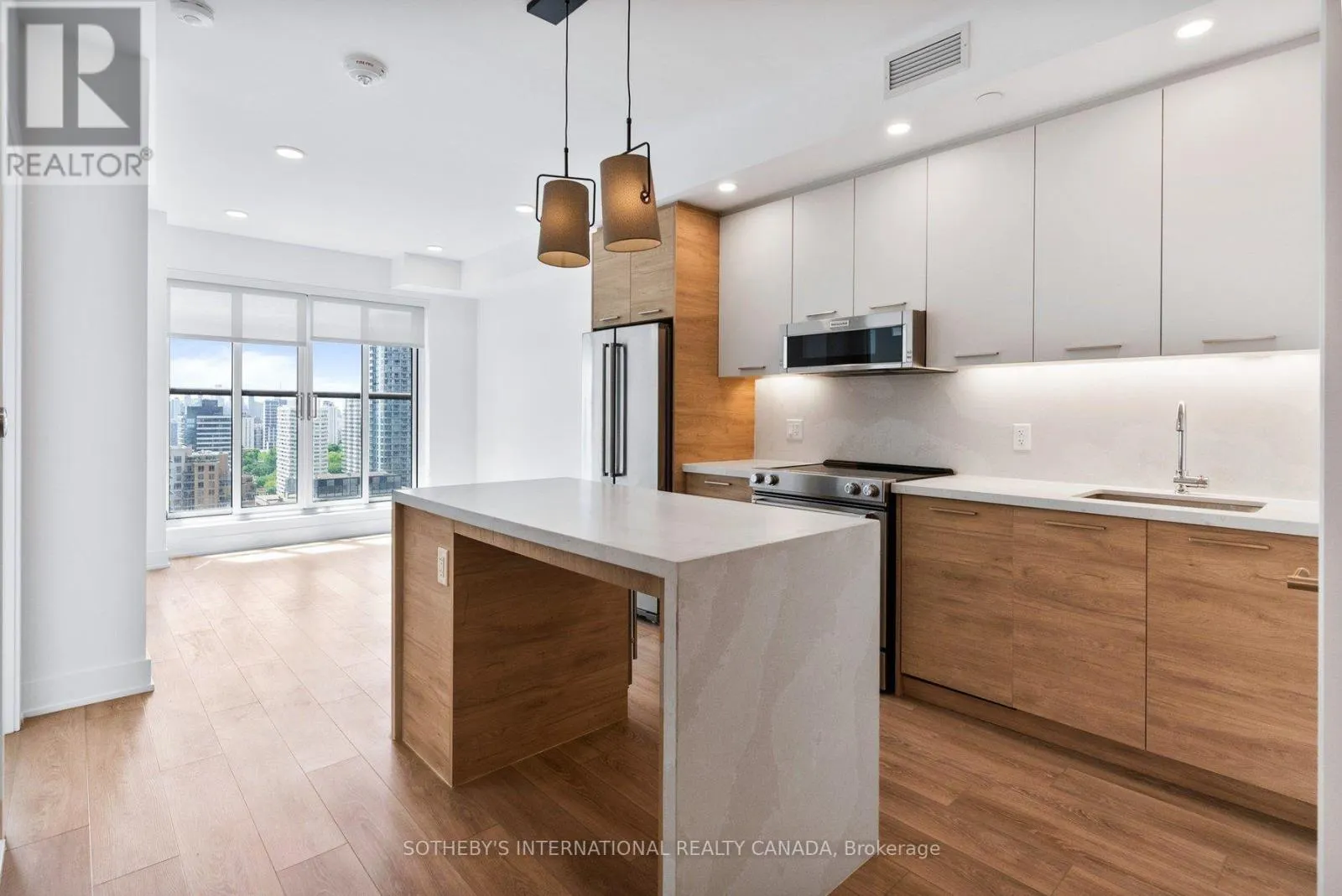 303 - 200 REDPATH AVENUE