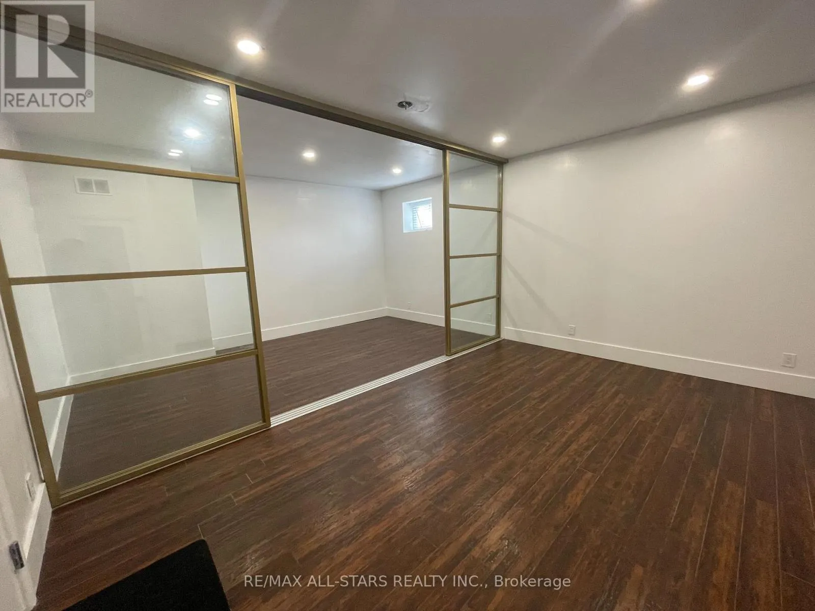 202A - 717 QUEEN STREET E