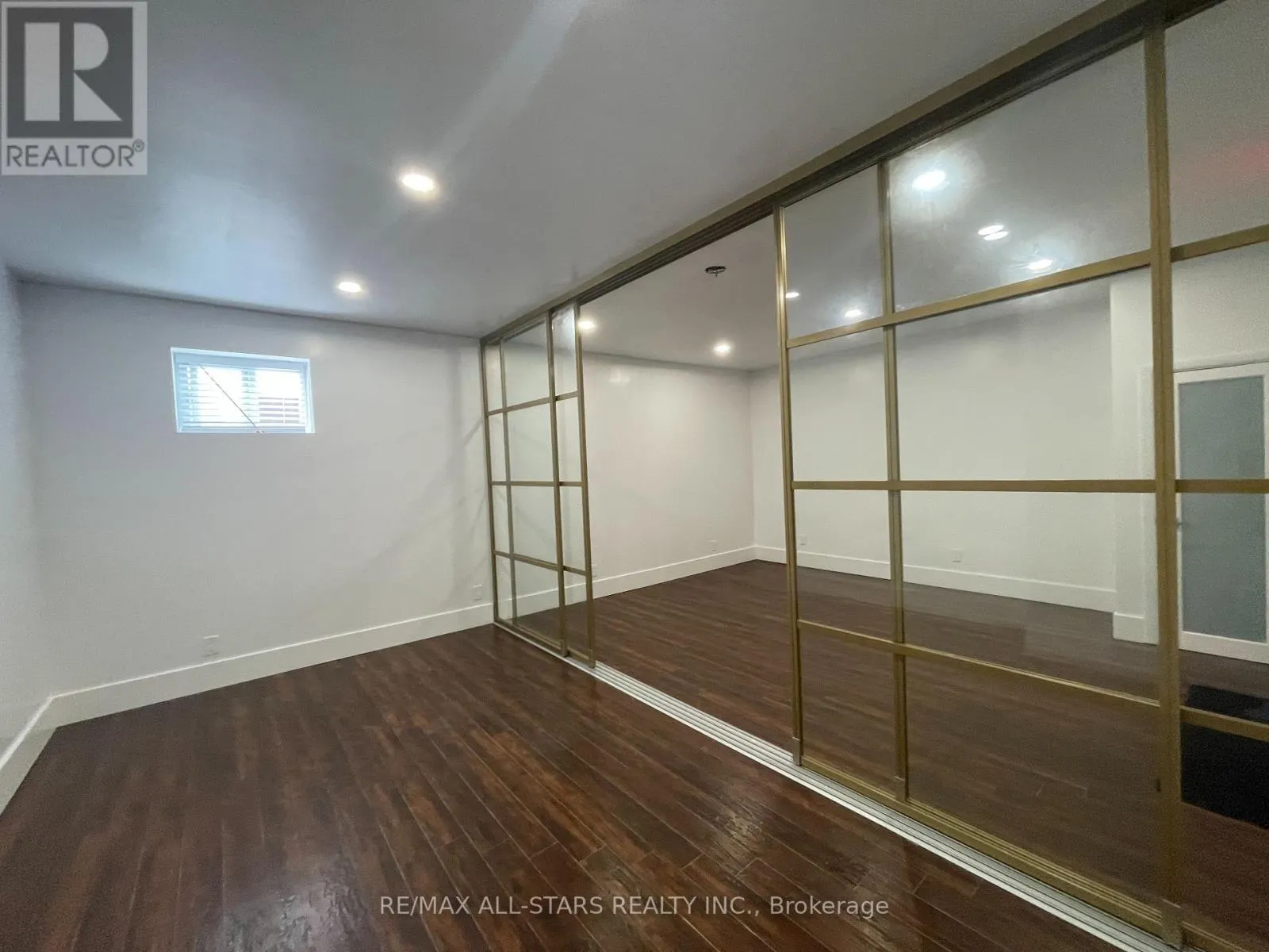202A - 717 QUEEN STREET E