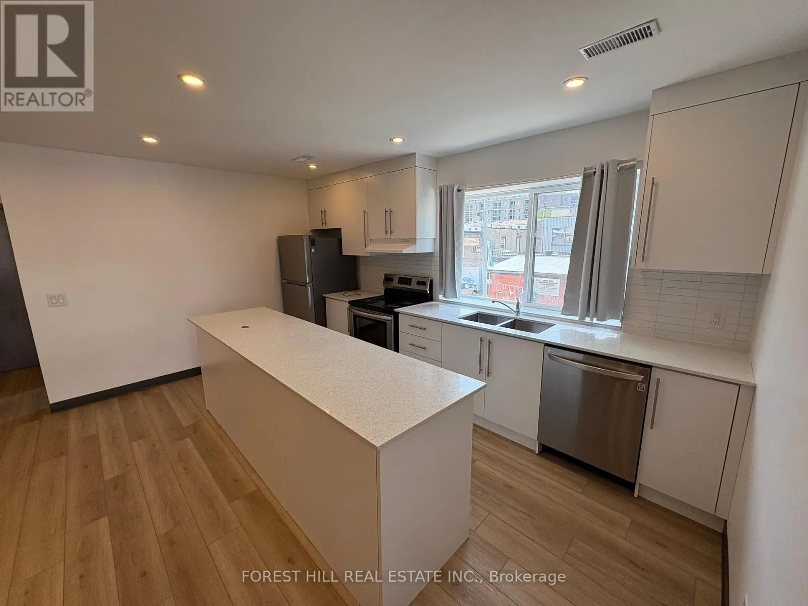 2 - 2879 DANFORTH AVENUE