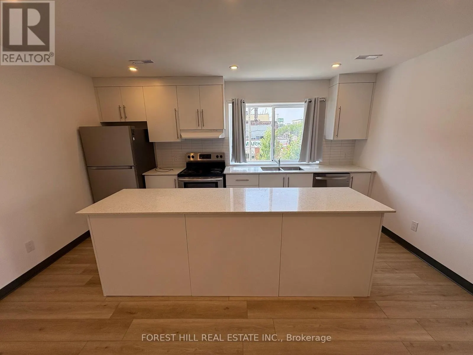2 - 2879 DANFORTH AVENUE