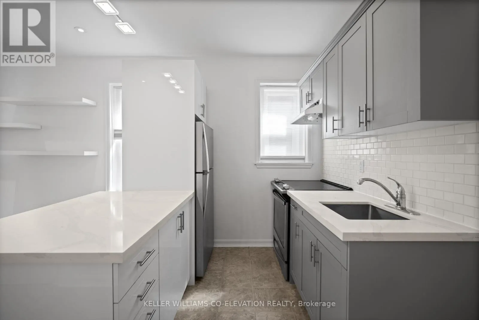 8 - 2461 QUEEN STREET E