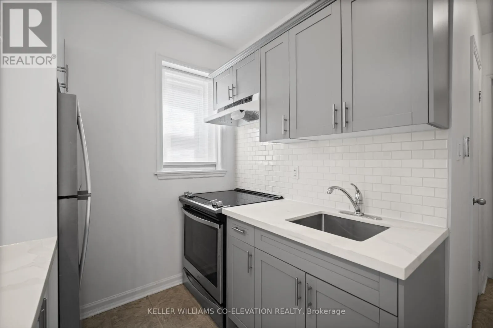 8 - 2461 QUEEN STREET E
