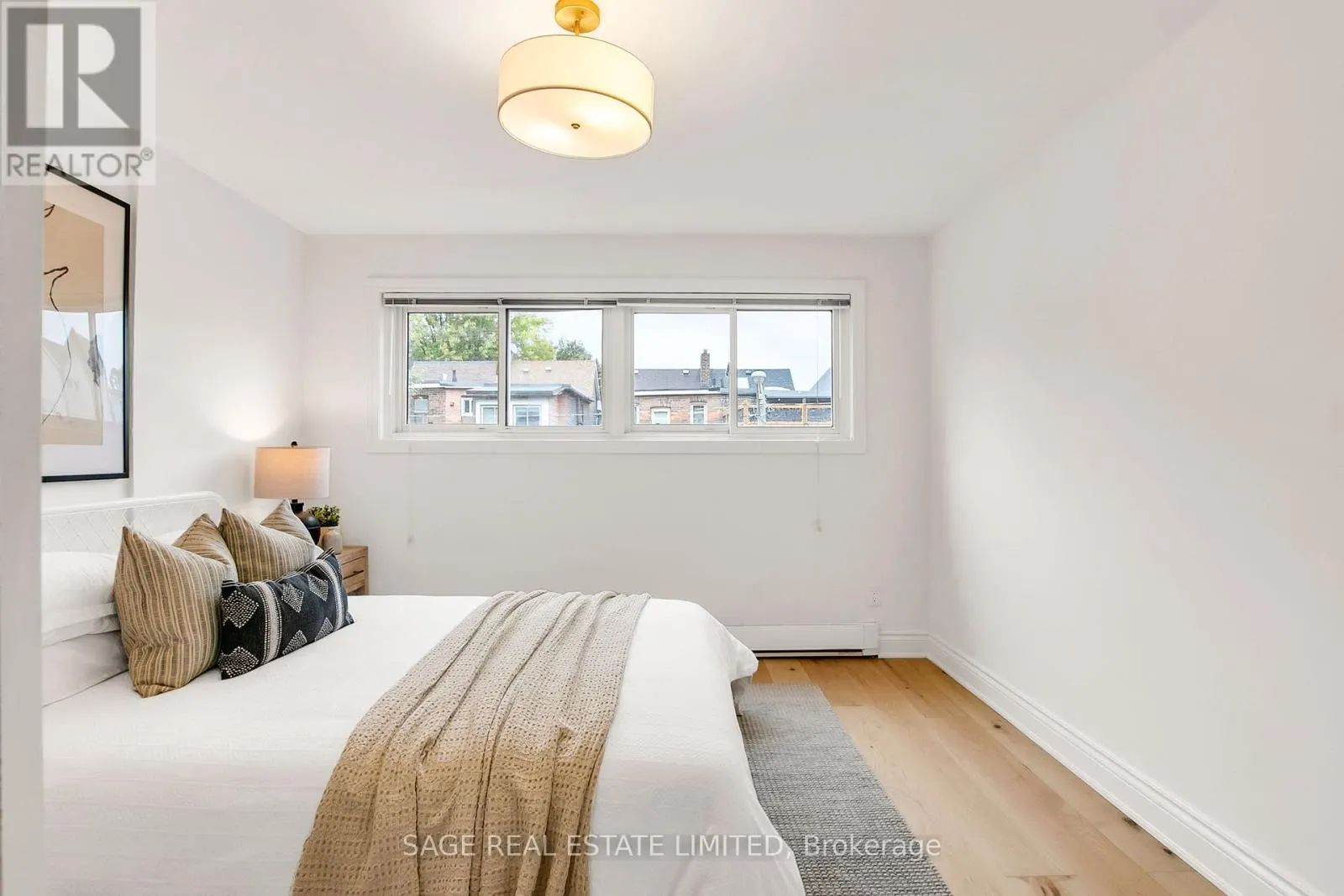7 - 1666 QUEEN STREET E