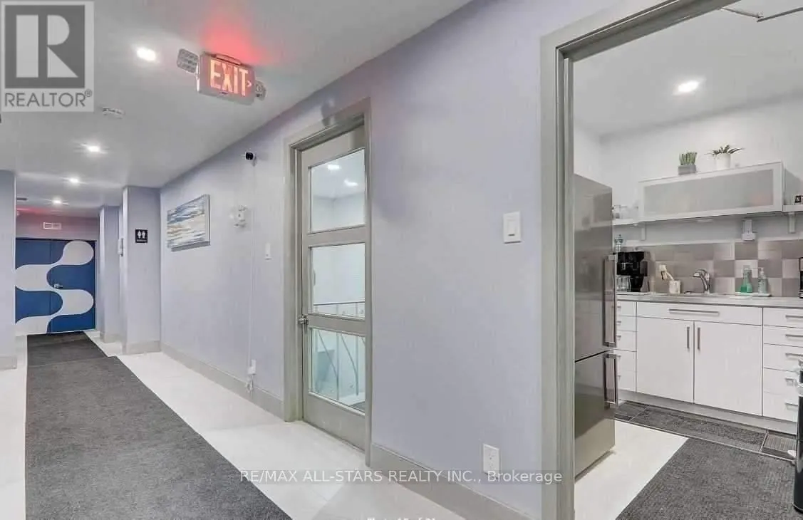 201 - 715 QUEEN STREET E