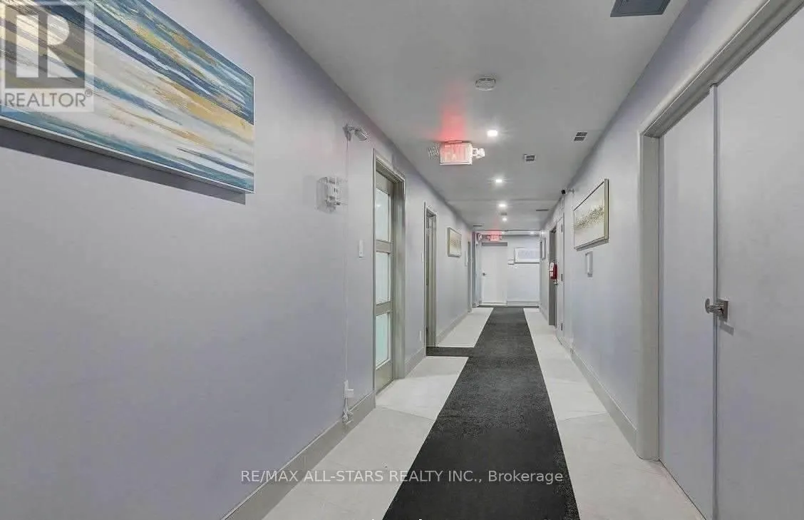 201 - 715 QUEEN STREET E