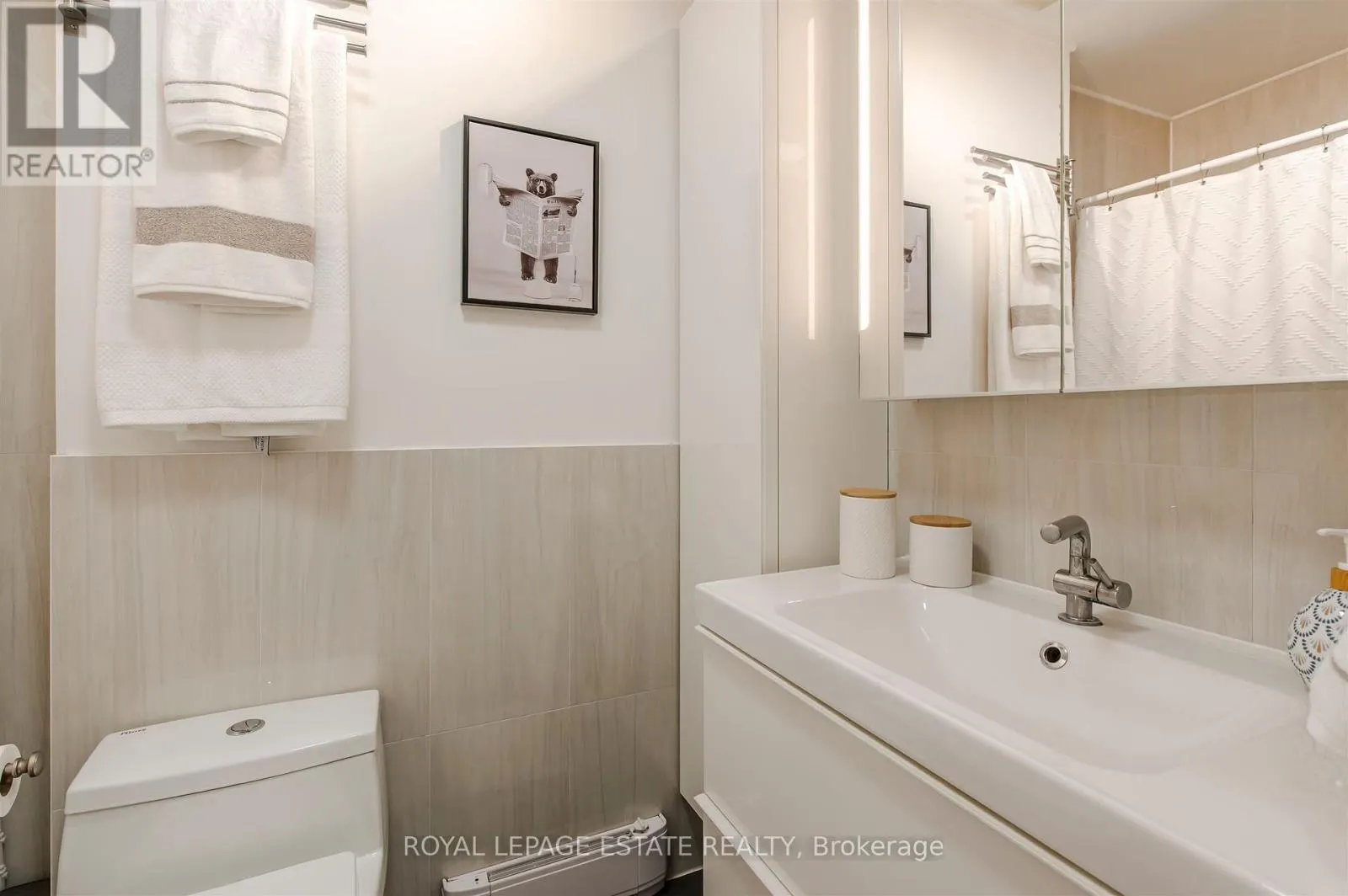 32 - 1209 QUEEN STREET E