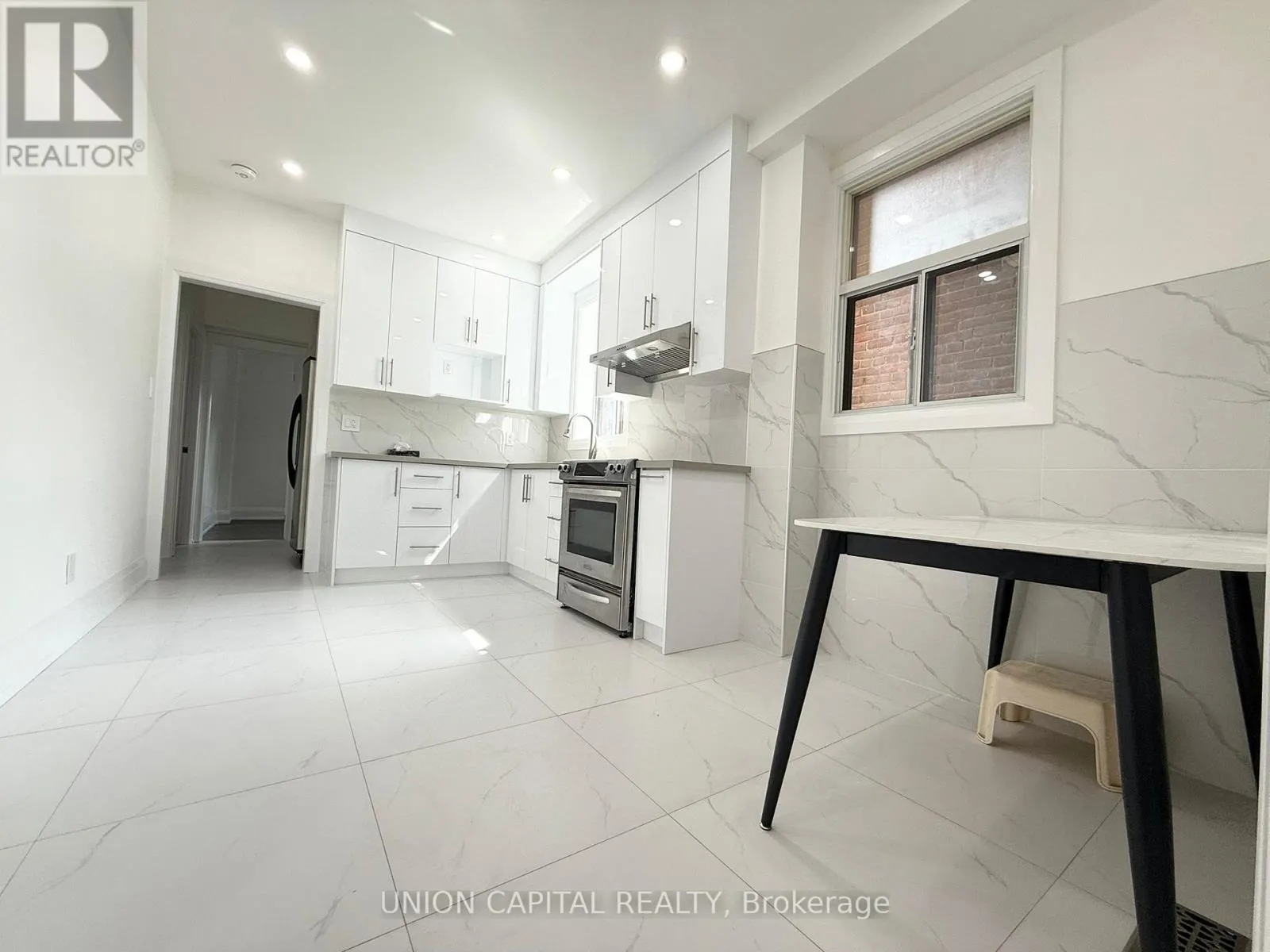 MAIN - 1087 GERRARD STREET E