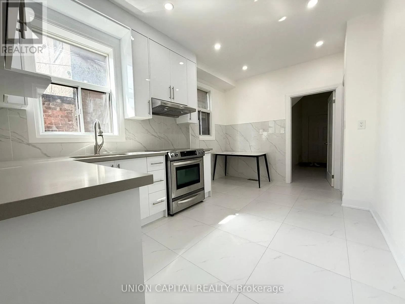 MAIN - 1087 GERRARD STREET E