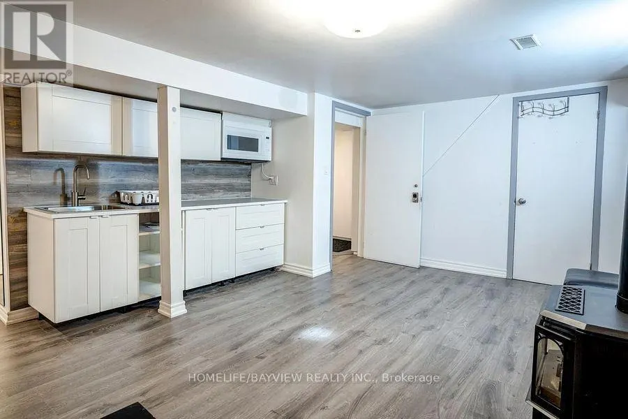LOWER - 61 SQUIRES AVENUE