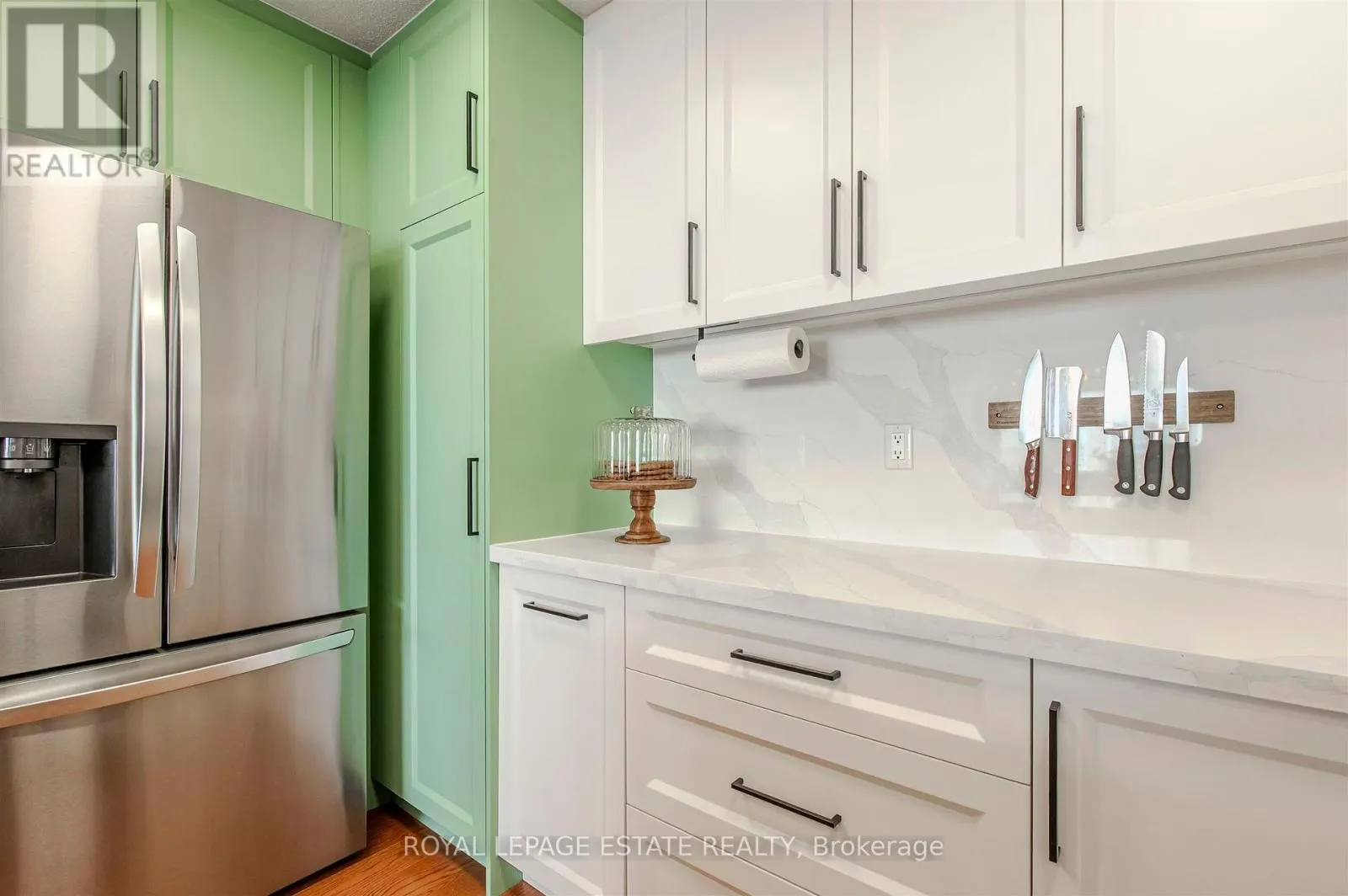 32 - 1209 QUEEN STREET E