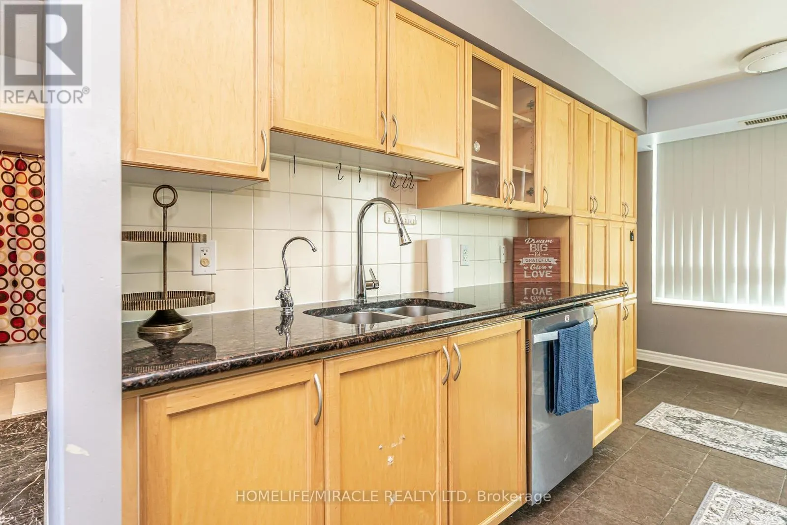 309 - 88 GRANGEWAY AVENUE