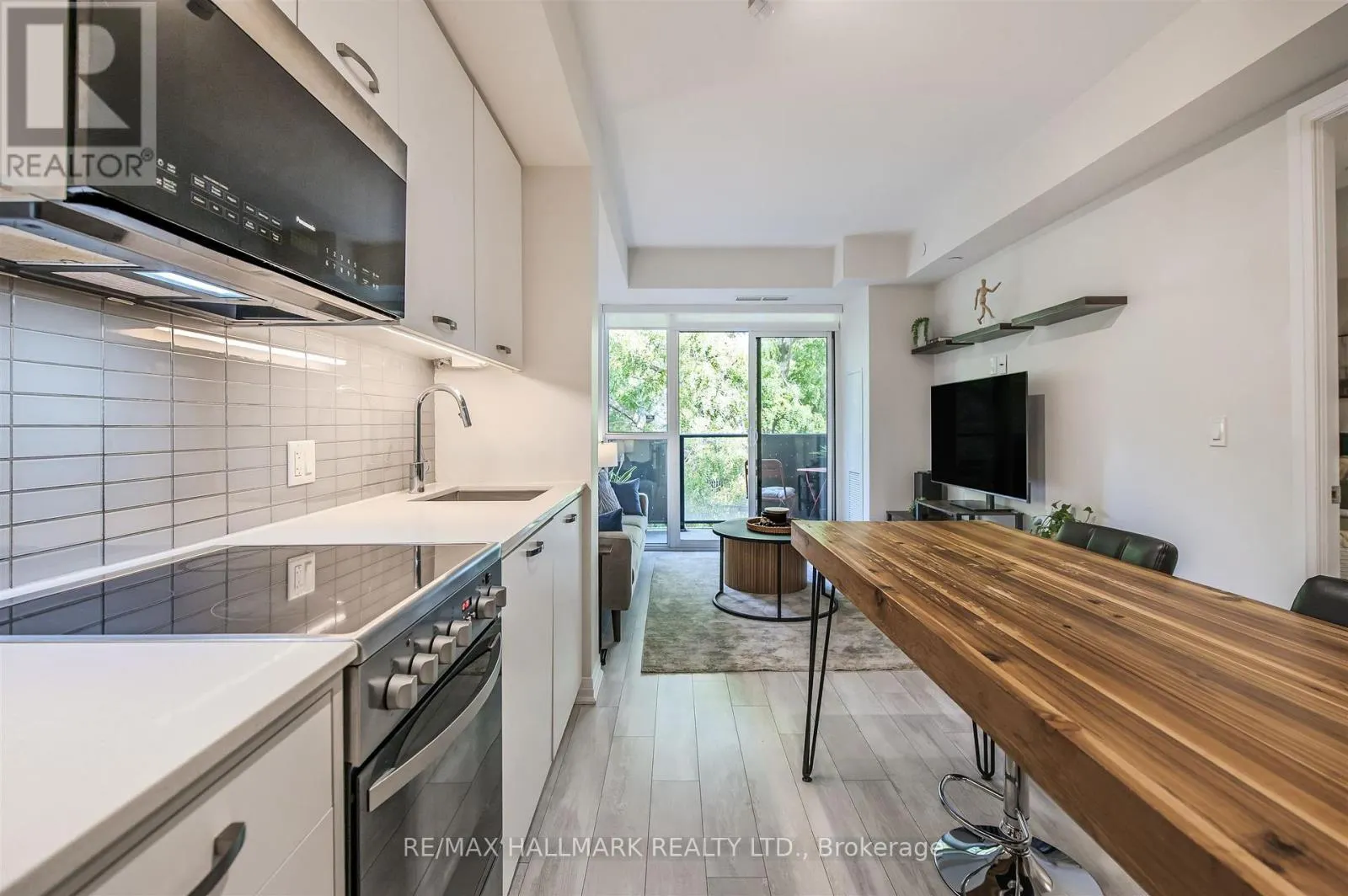 321 - 1630 QUEEN STREET E