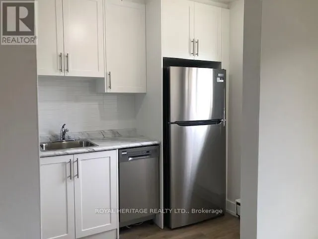 103 - 945 SIMCOE STREET N