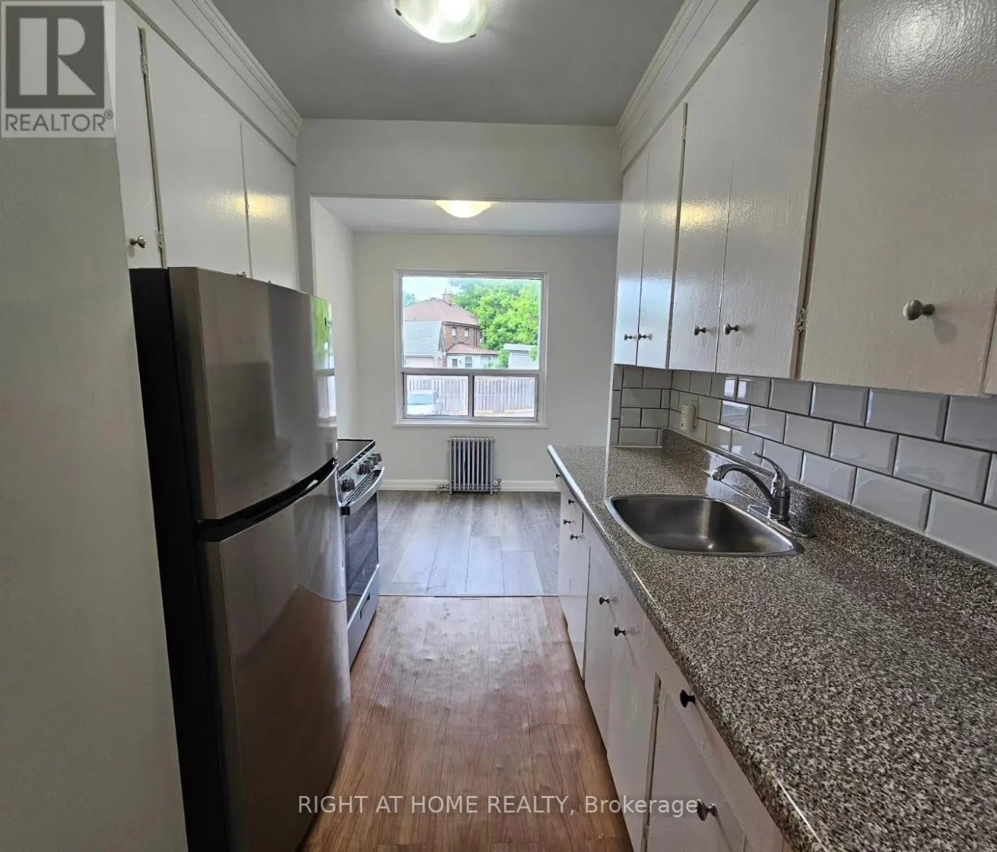 203 - 20 COSBURN AVENUE
