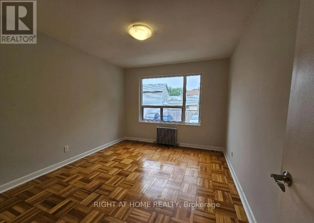 203 - 20 COSBURN AVENUE
