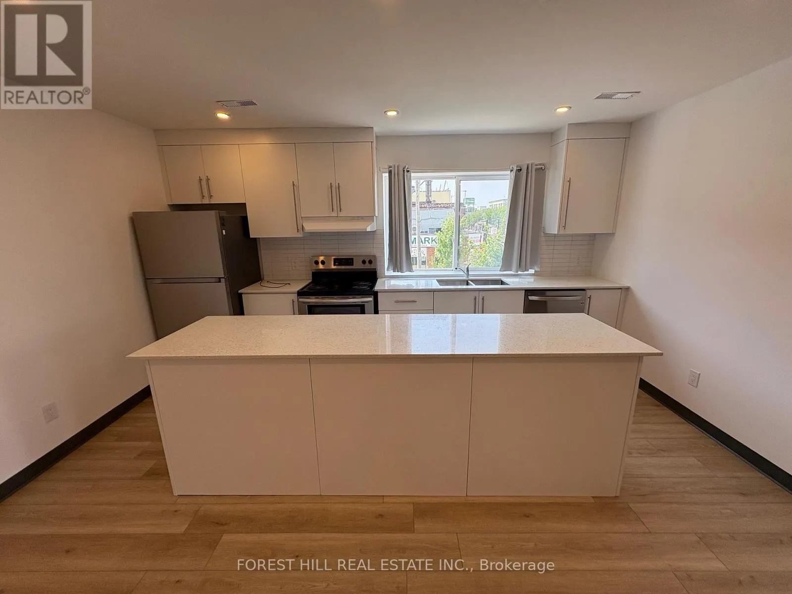 2 - 2879 DANFORTH AVENUE