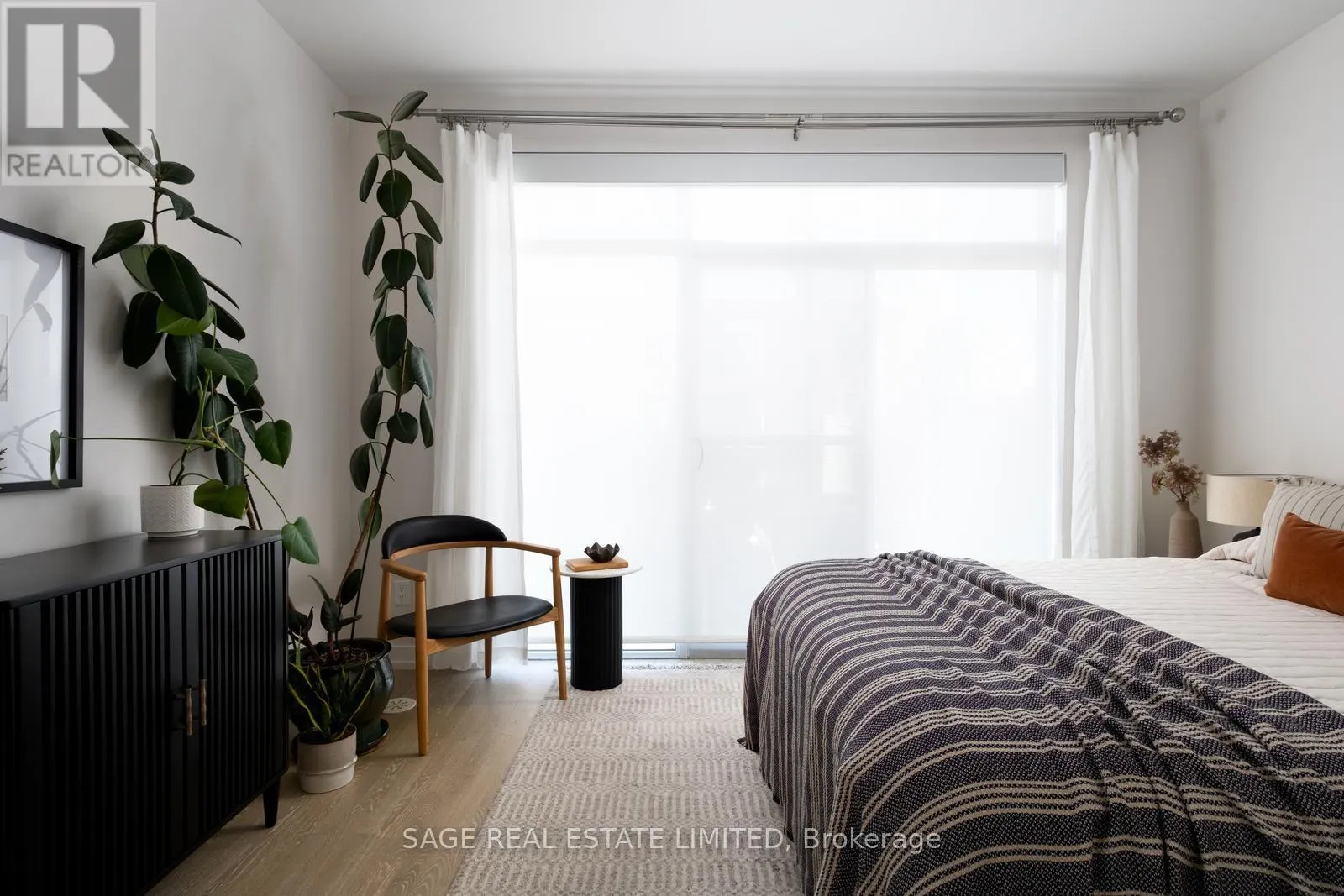 8 - 1321 GERRARD STREET E