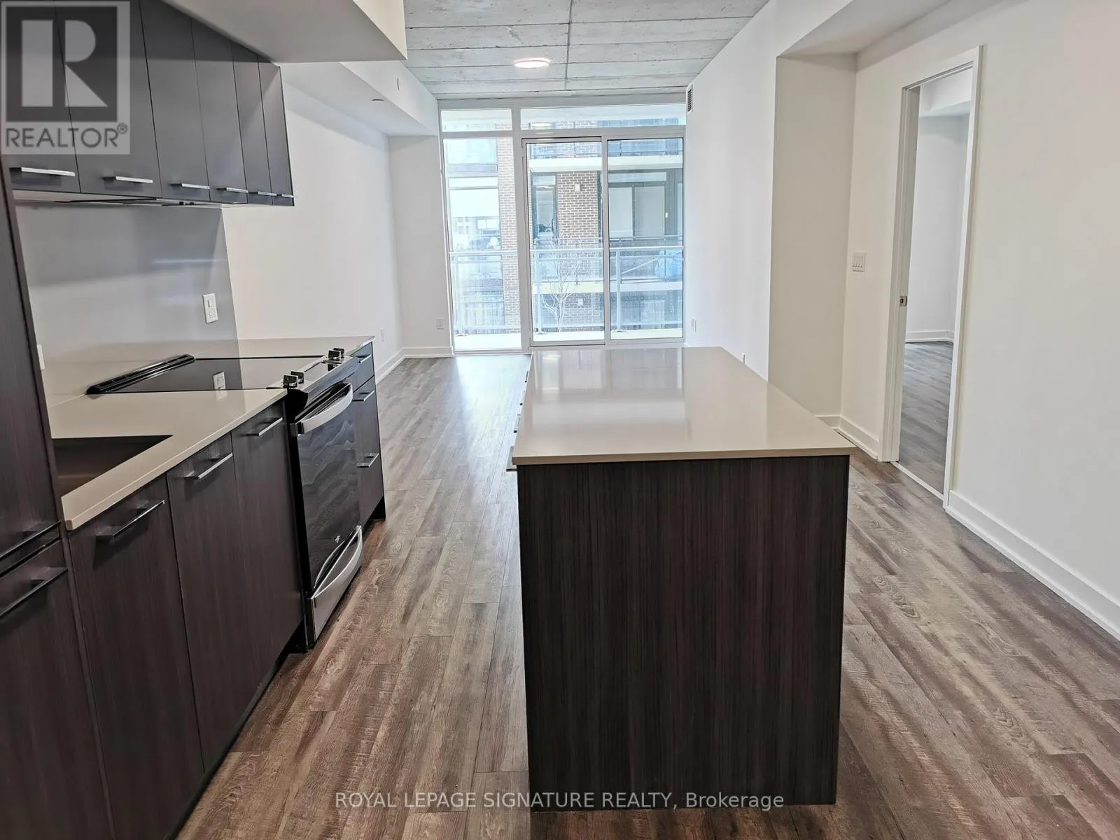 312 - 665 QUEEN STREET E