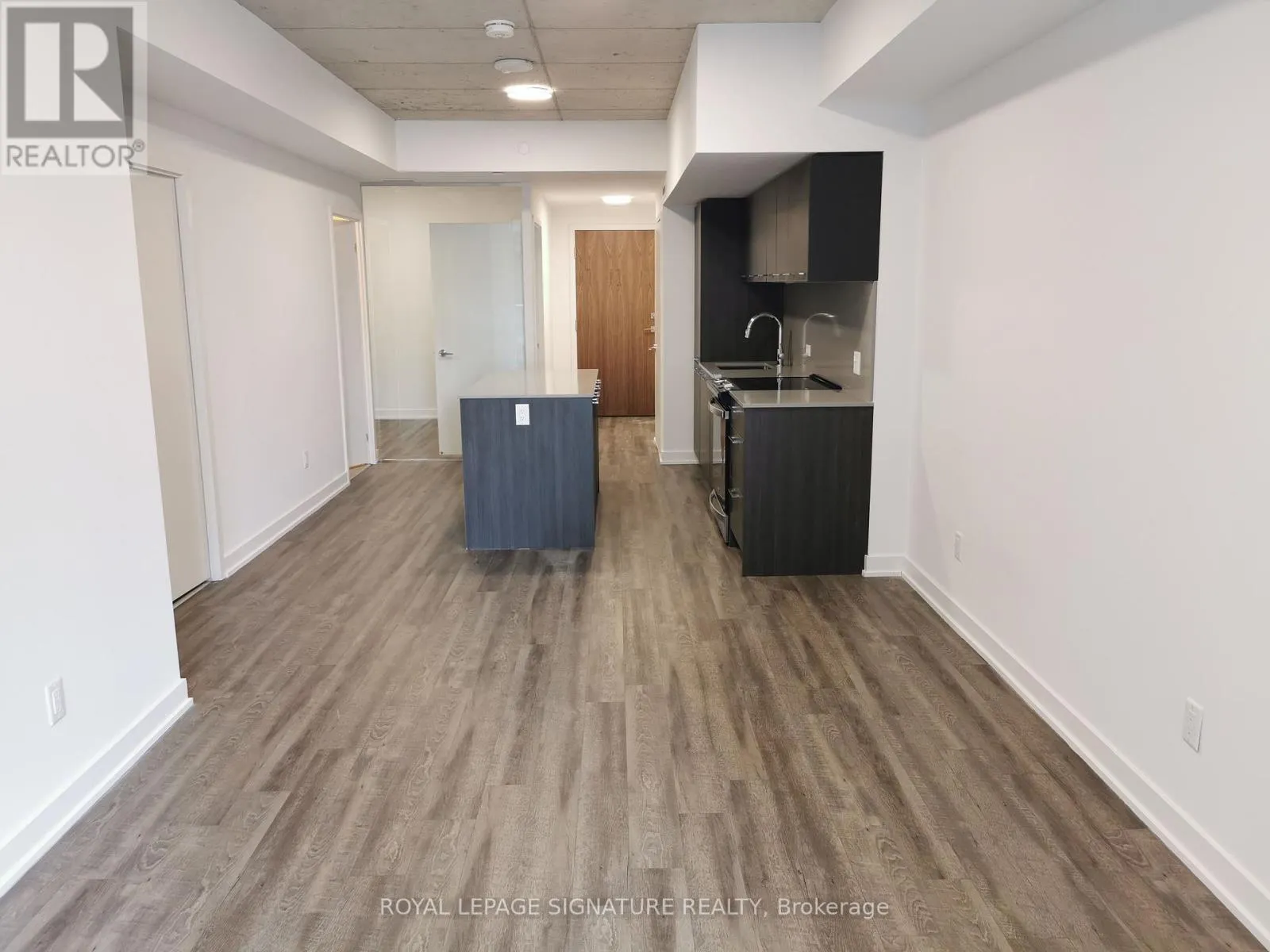 312 - 665 QUEEN STREET E