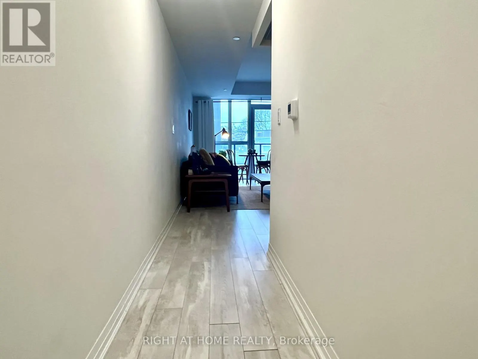 202 - 1630 QUEEN STREET E