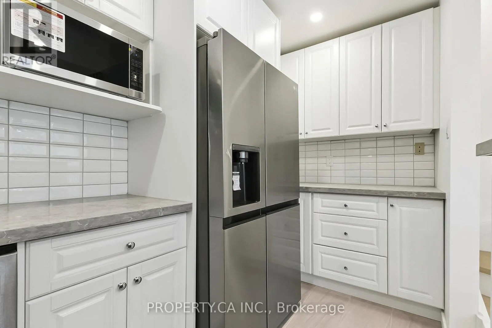 29 - 1209 QUEEN STREET E