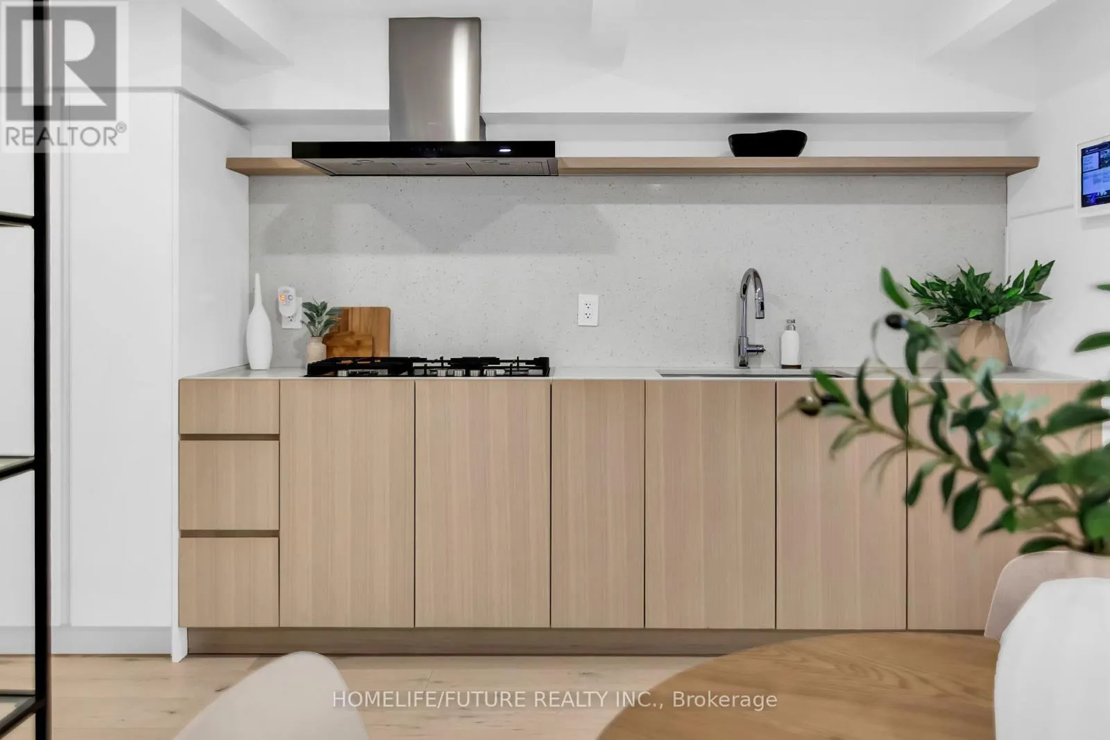 102 - 660 PAPE AVENUE