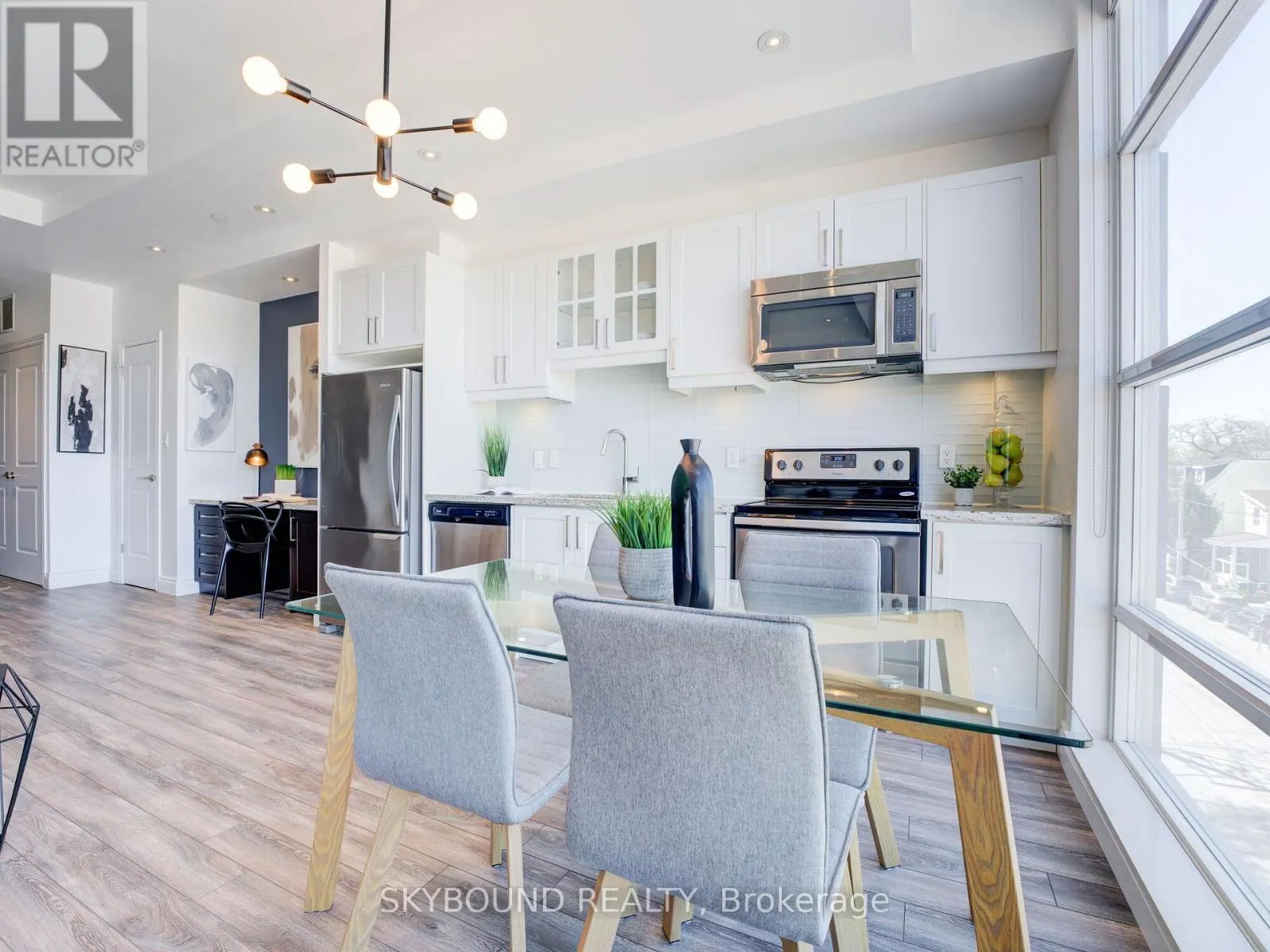 302 - 1003 QUEEN STREET E