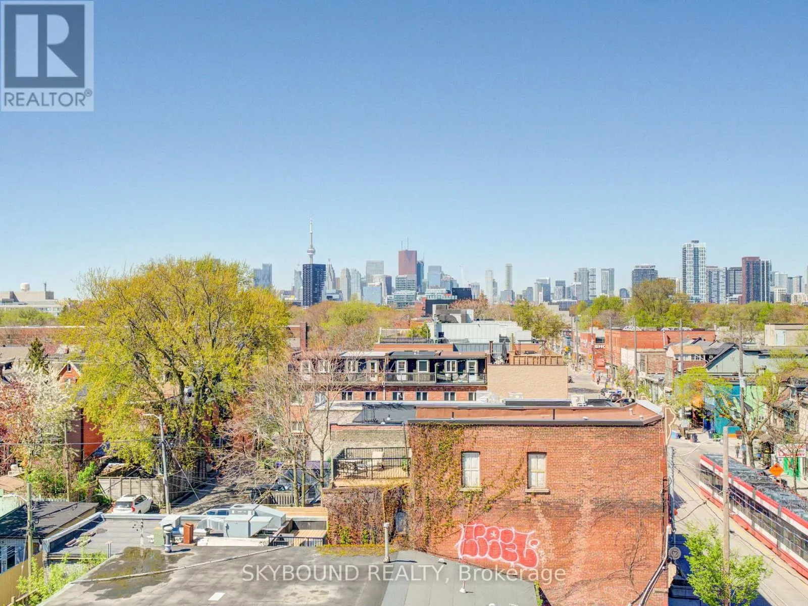 302 - 1003 QUEEN STREET E