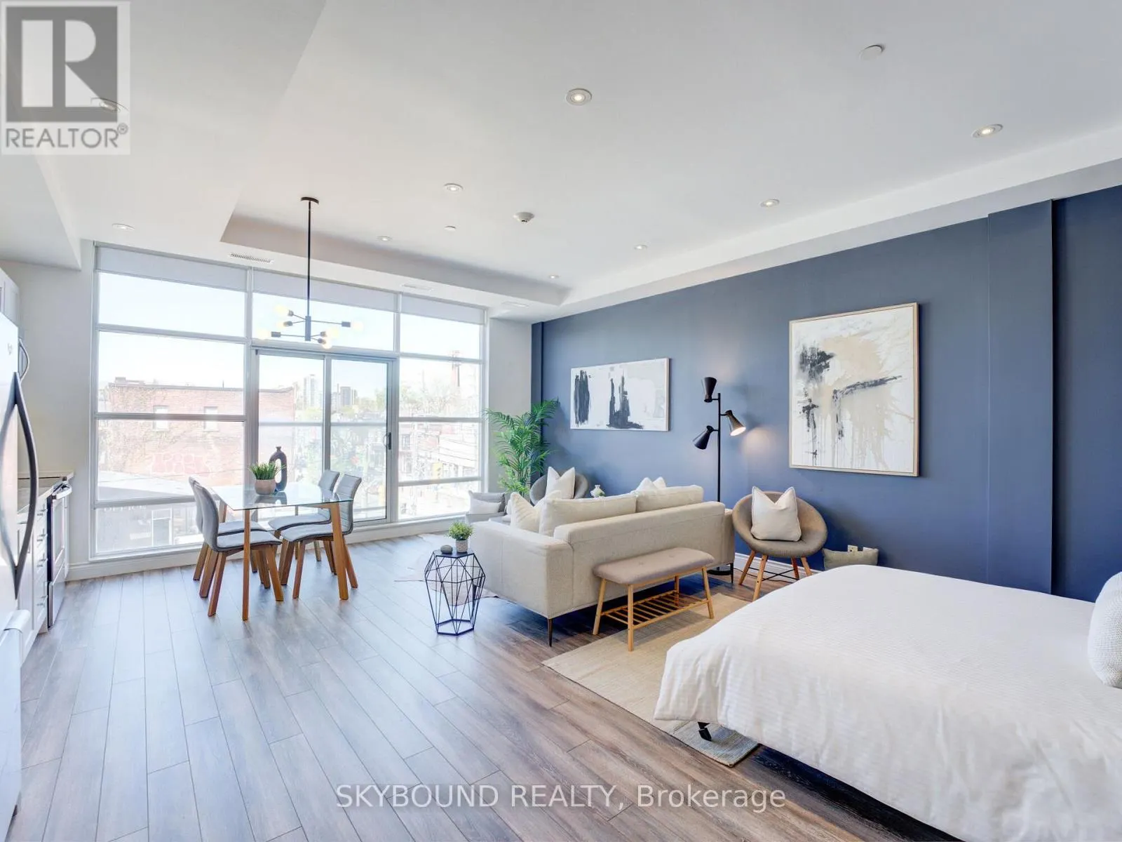 302 - 1003 QUEEN STREET E