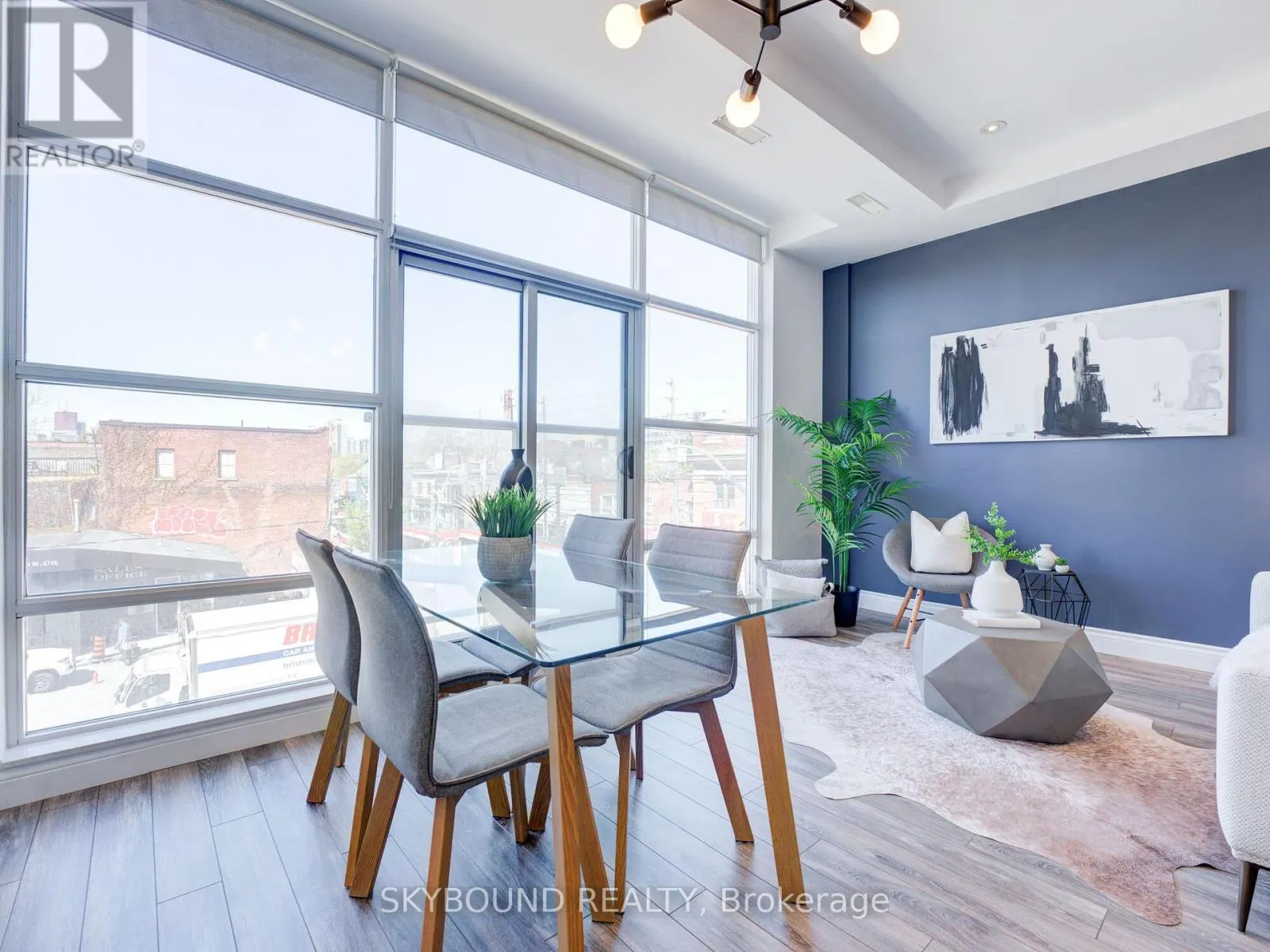 302 - 1003 QUEEN STREET E