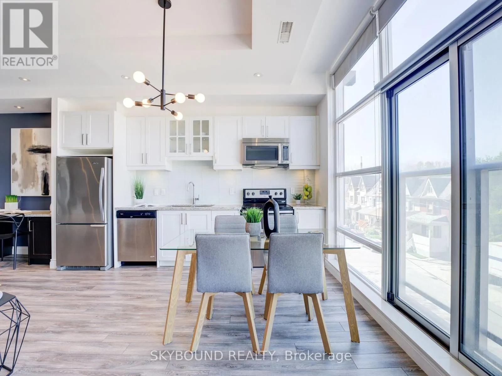 302 - 1003 QUEEN STREET E