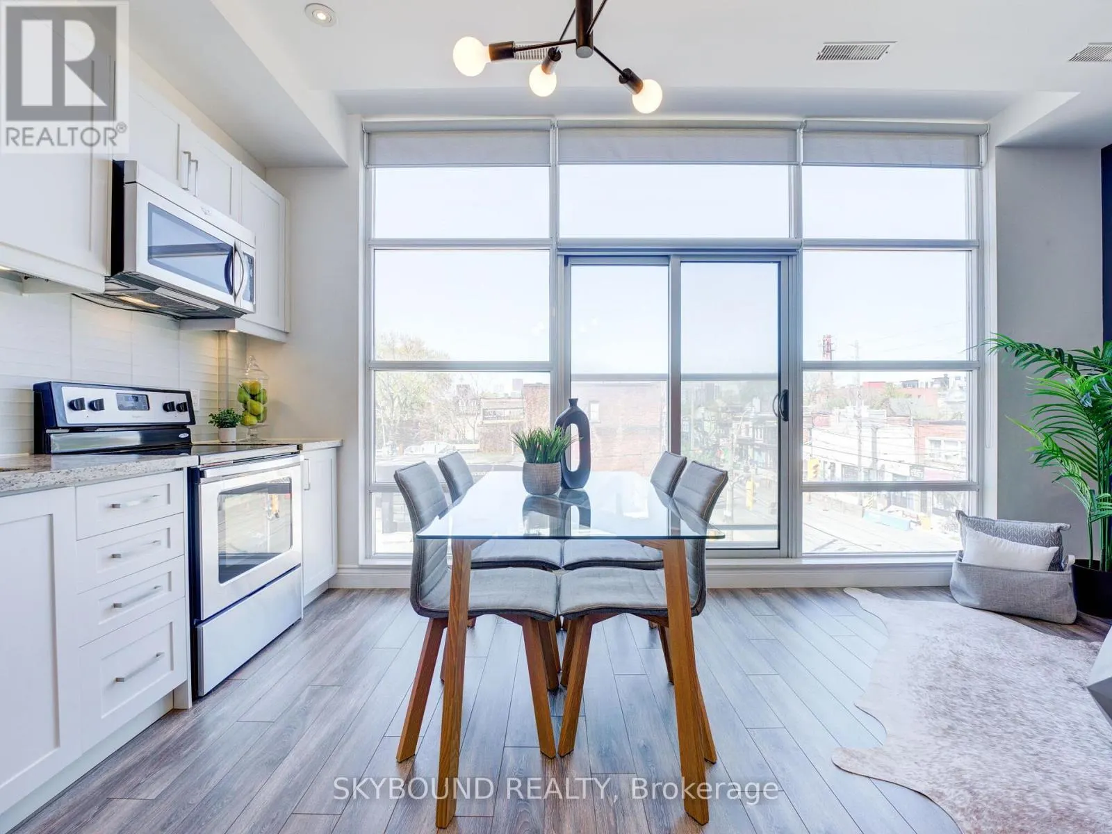 302 - 1003 QUEEN STREET E