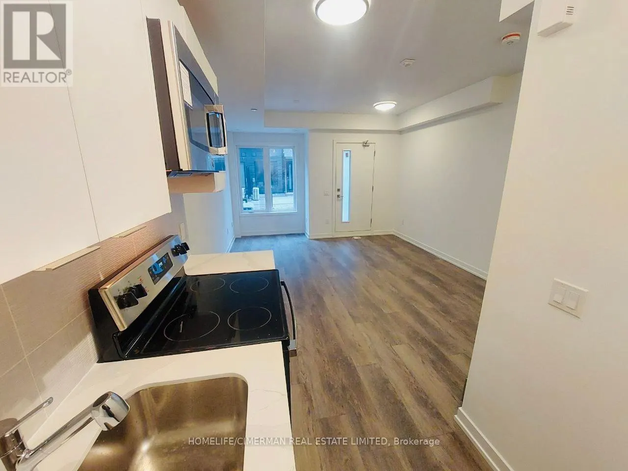 3 - 3069 PHARMACY AVENUE