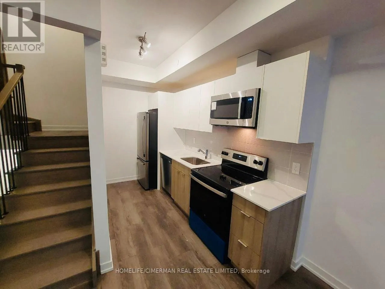 3 - 3069 PHARMACY AVENUE