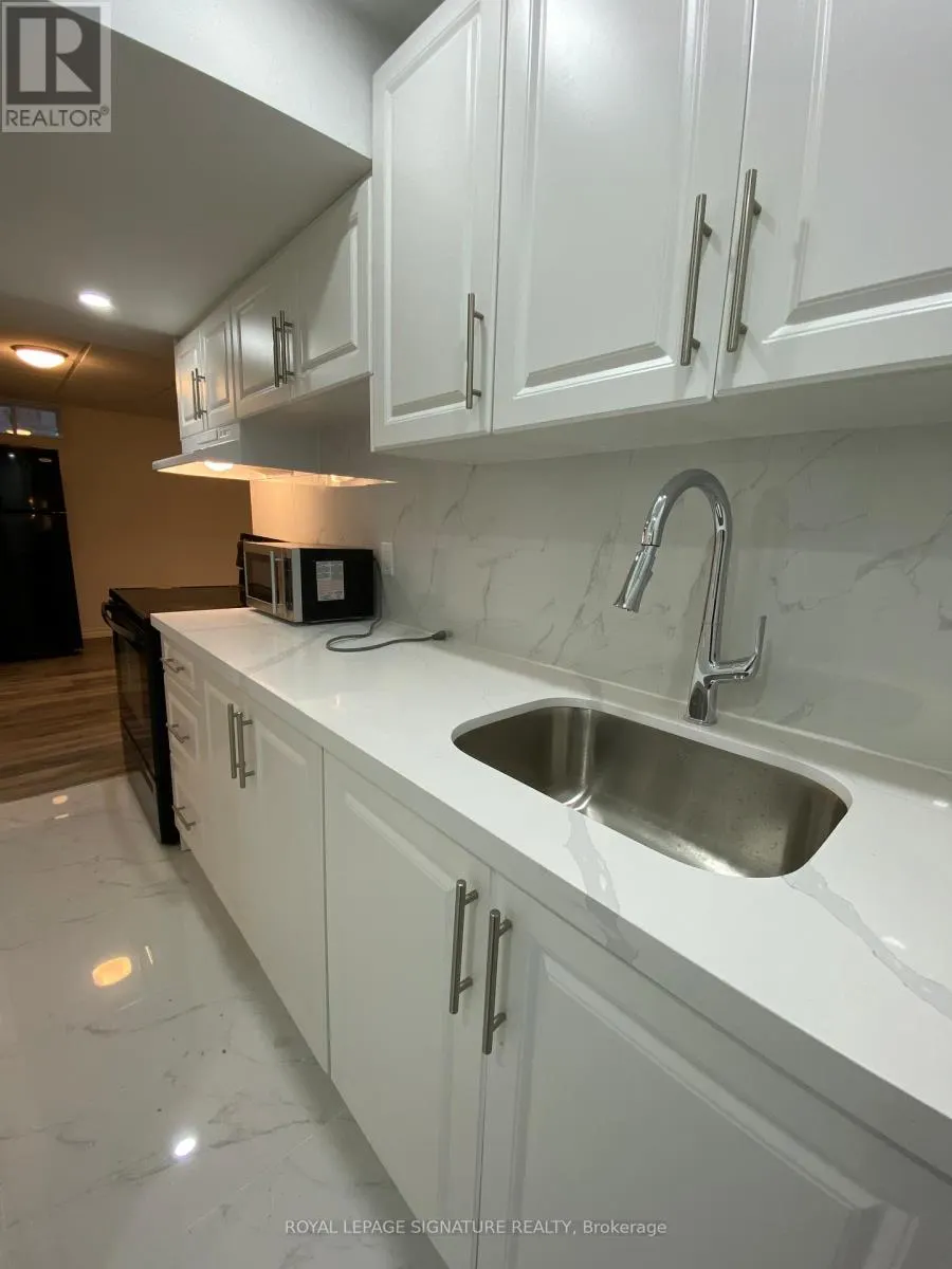 LOWER LEVEL - 123 MILDENHALL PLACE