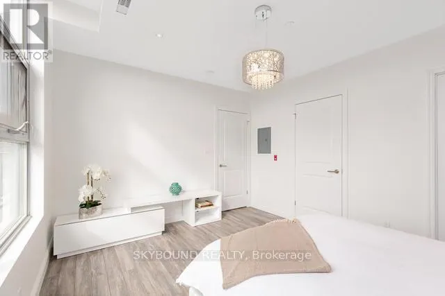 303 - 1003 QUEEN STREET E