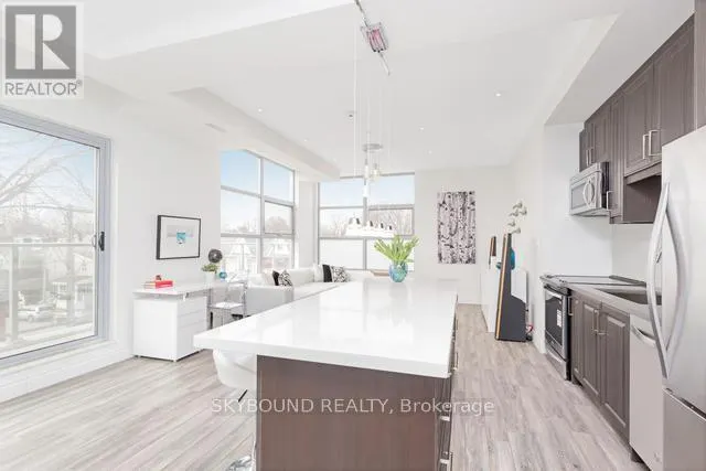 303 - 1003 QUEEN STREET E