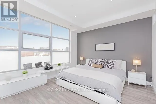 303 - 1003 QUEEN STREET E