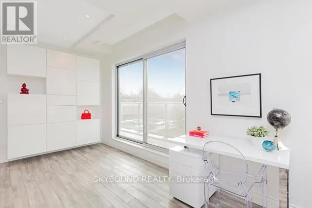 303 - 1003 QUEEN STREET E