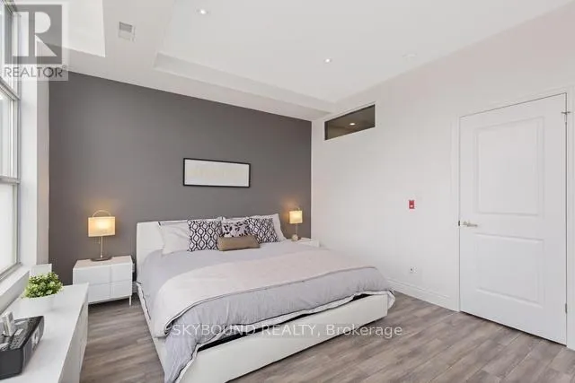 303 - 1003 QUEEN STREET E