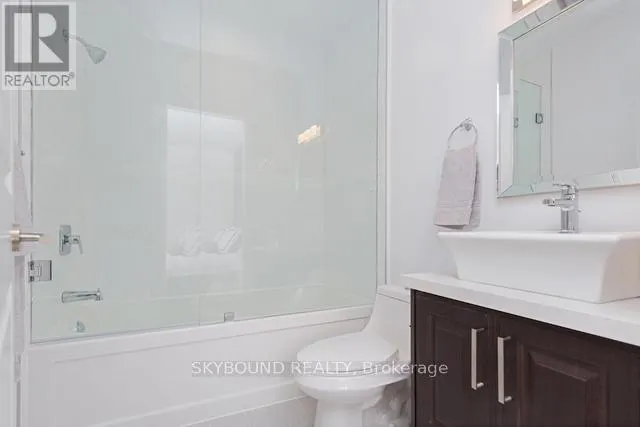 303 - 1003 QUEEN STREET E