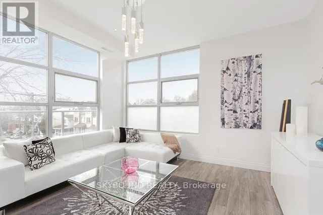 303 - 1003 QUEEN STREET E