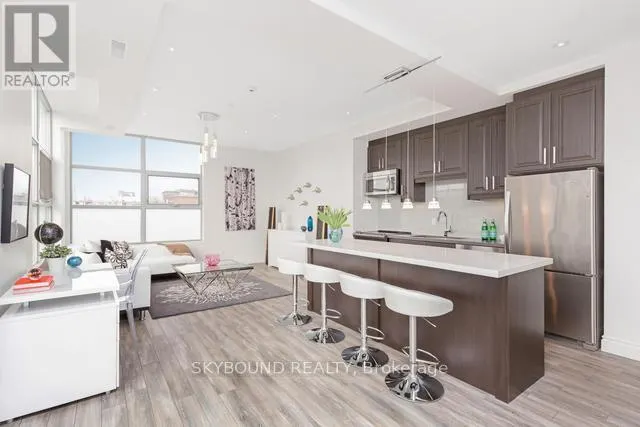 303 - 1003 QUEEN STREET E