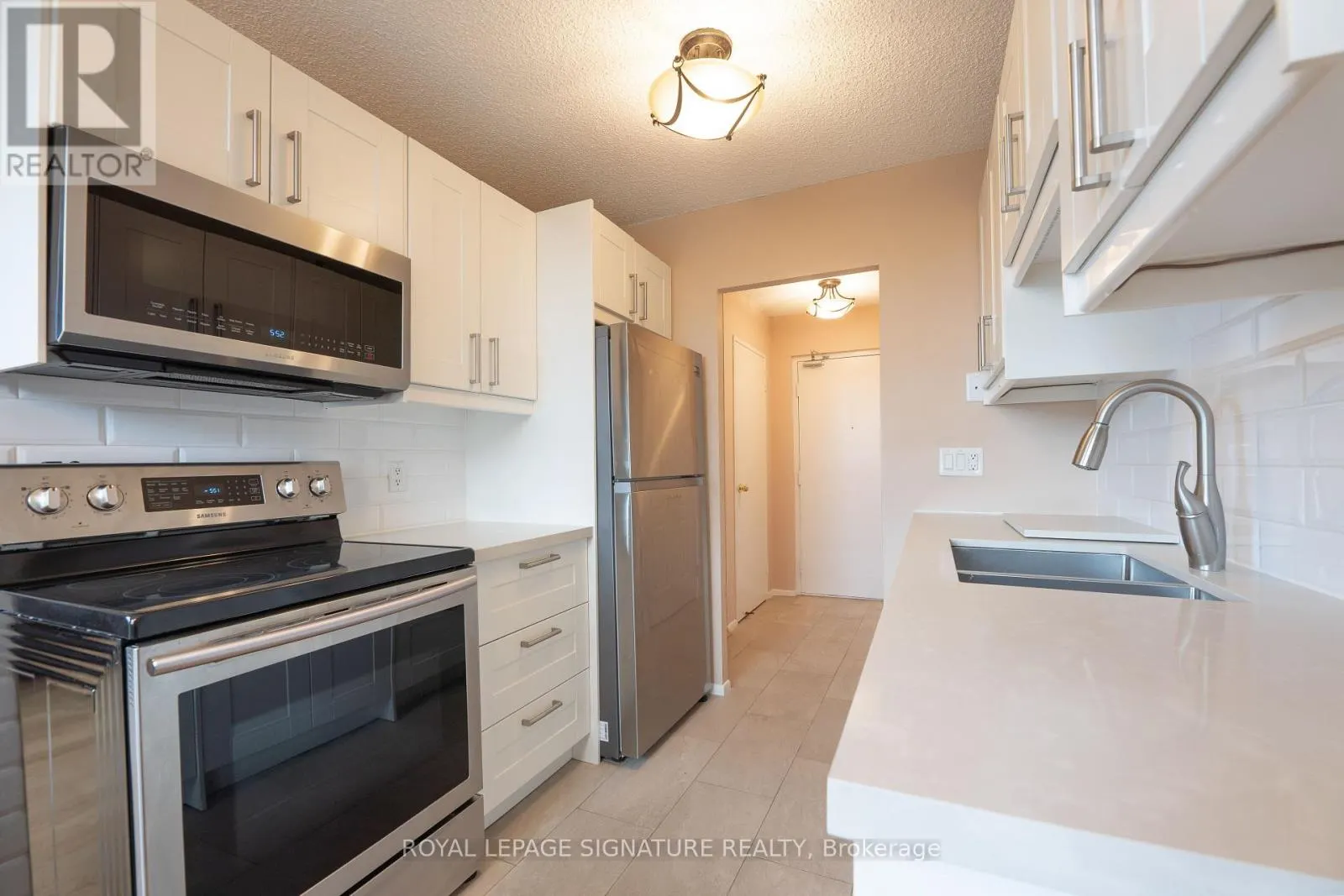 211 - 1071 WOODBINE AVENUE