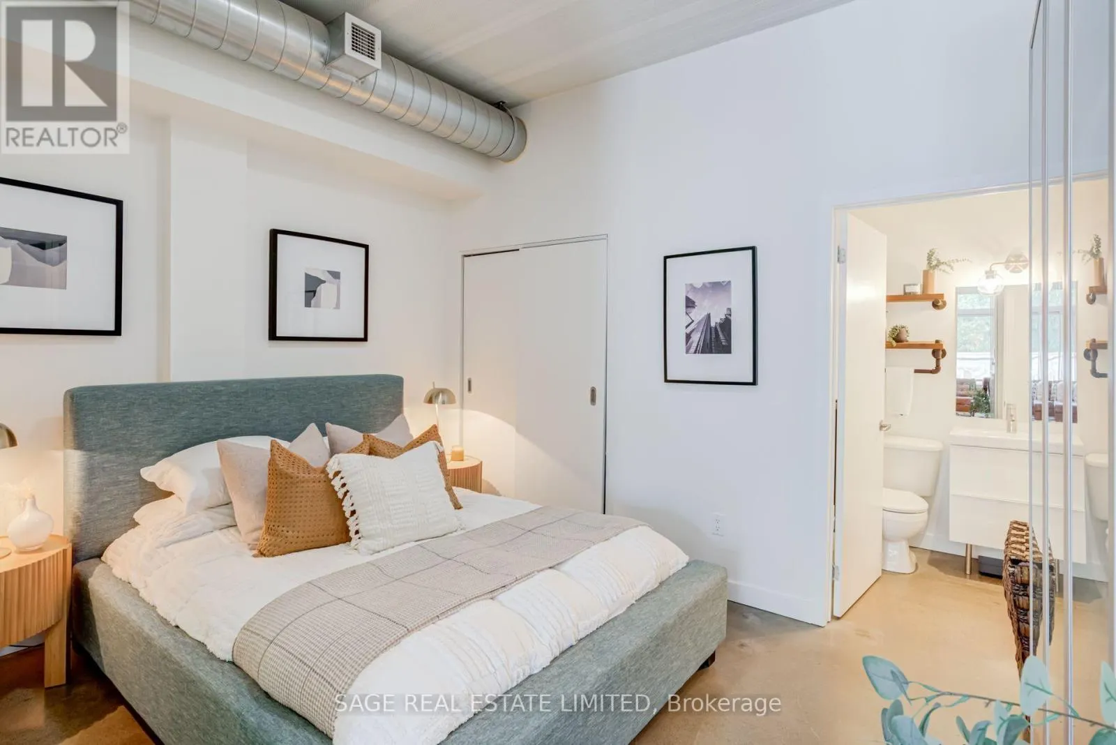 204 - 747 QUEEN STREET E