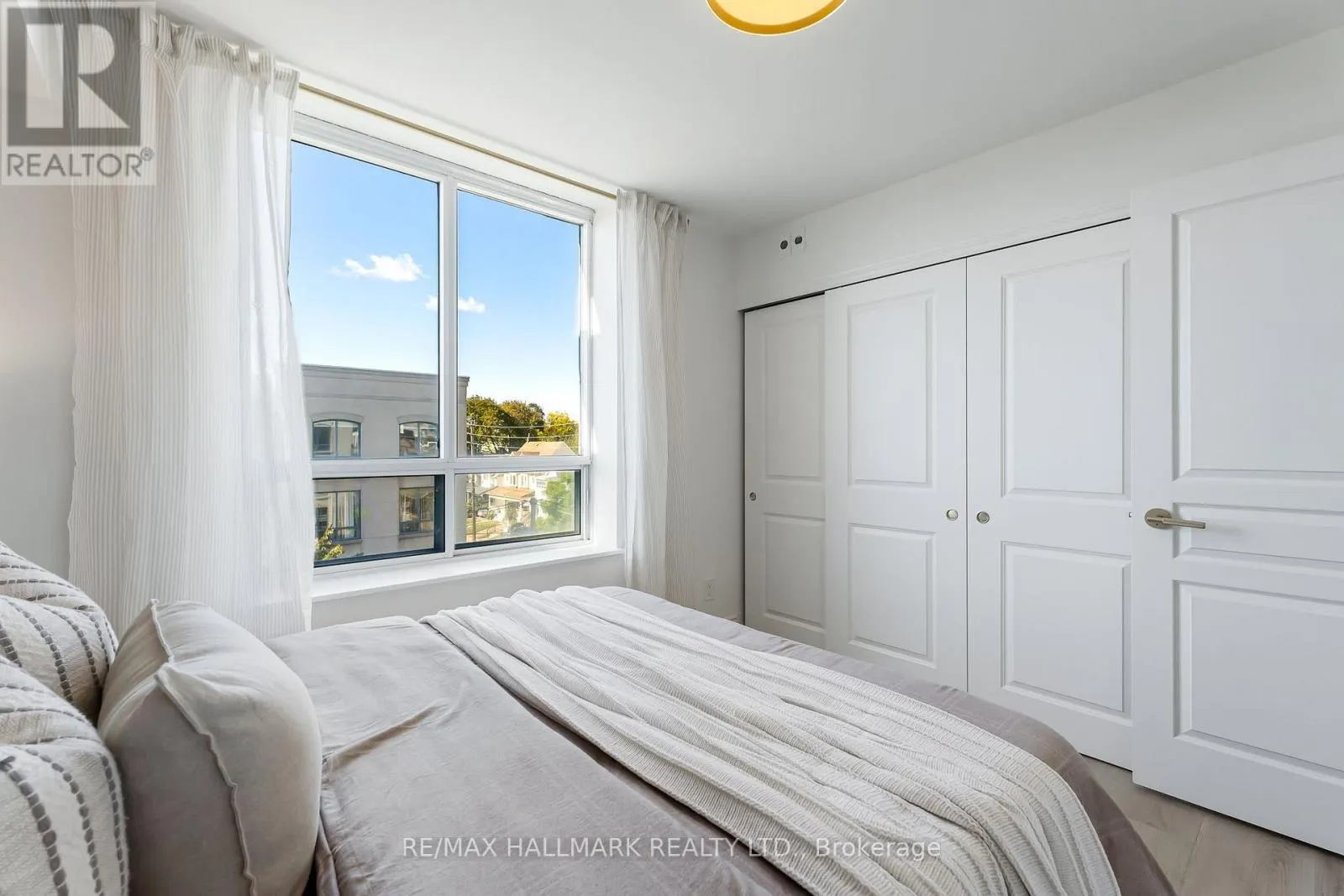 404 - 1797 QUEEN STREET E