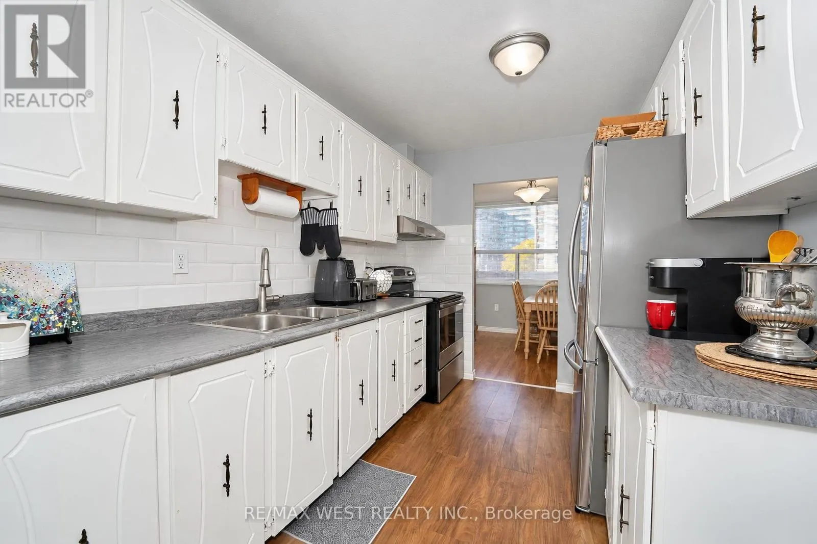 221C - 4064 LAWRENCE AVENUE E